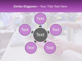 A Person Holding A Pink Object In Front Of A Computer PowerPoint Template