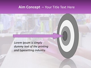 A Person Holding A Pink Object In Front Of A Computer PowerPoint Template