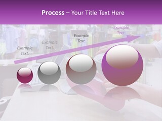 A Person Holding A Pink Object In Front Of A Computer PowerPoint Template