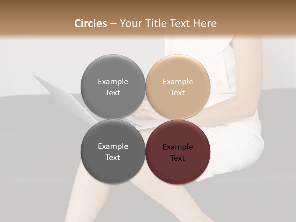 A Woman Sitting On A Couch Using A Laptop Computer PowerPoint Template