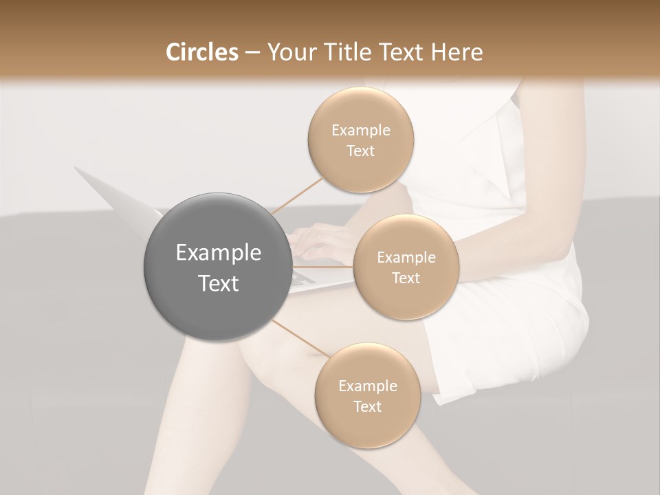 A Woman Sitting On A Couch Using A Laptop Computer PowerPoint Template