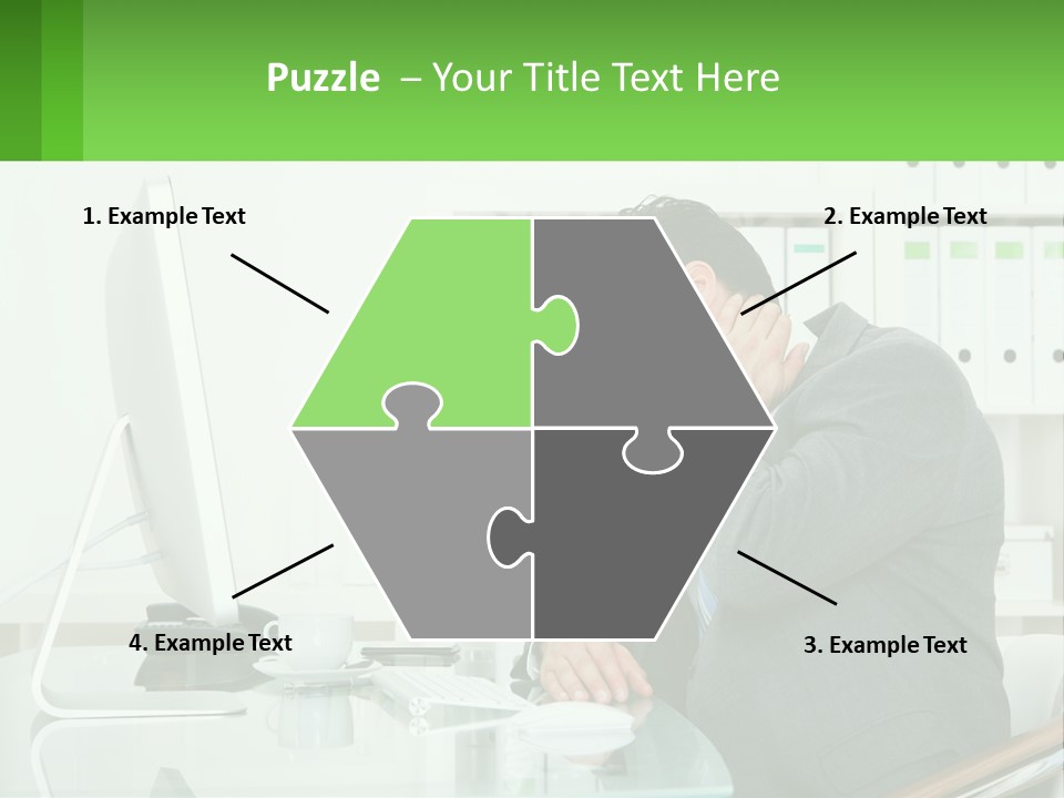 A Man Sitting At A Desk In Front Of A Computer PowerPoint Template