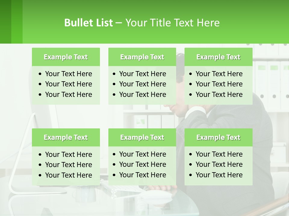 A Man Sitting At A Desk In Front Of A Computer PowerPoint Template