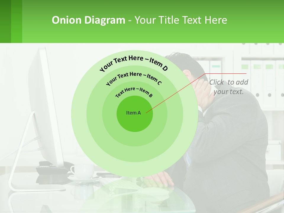 A Man Sitting At A Desk In Front Of A Computer PowerPoint Template