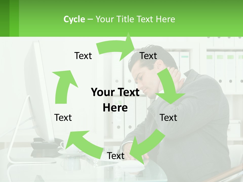 A Man Sitting At A Desk In Front Of A Computer PowerPoint Template