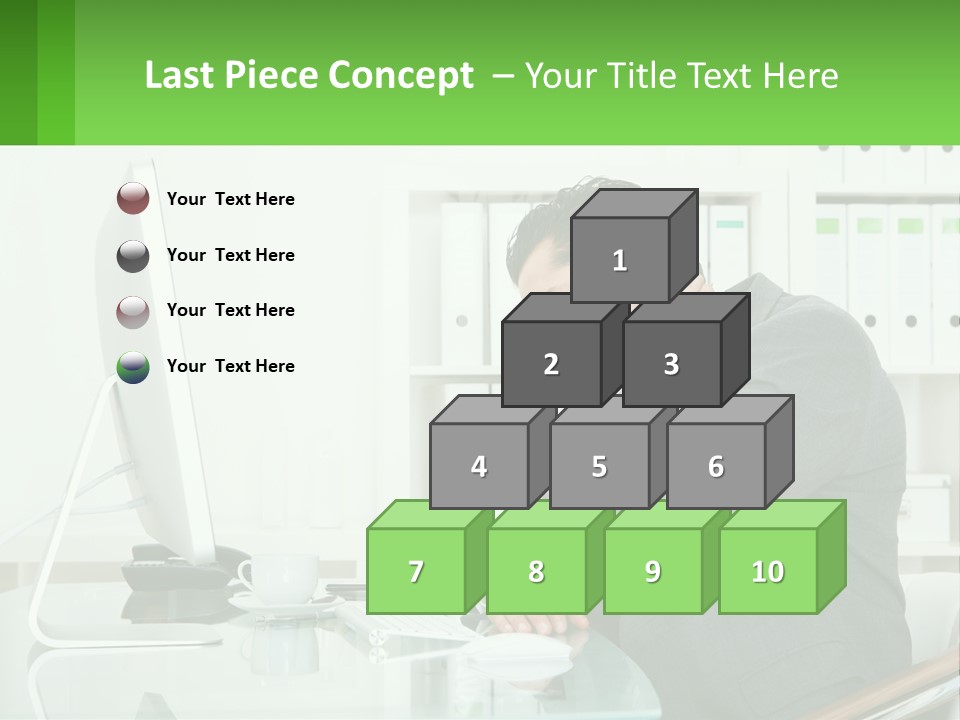 A Man Sitting At A Desk In Front Of A Computer PowerPoint Template