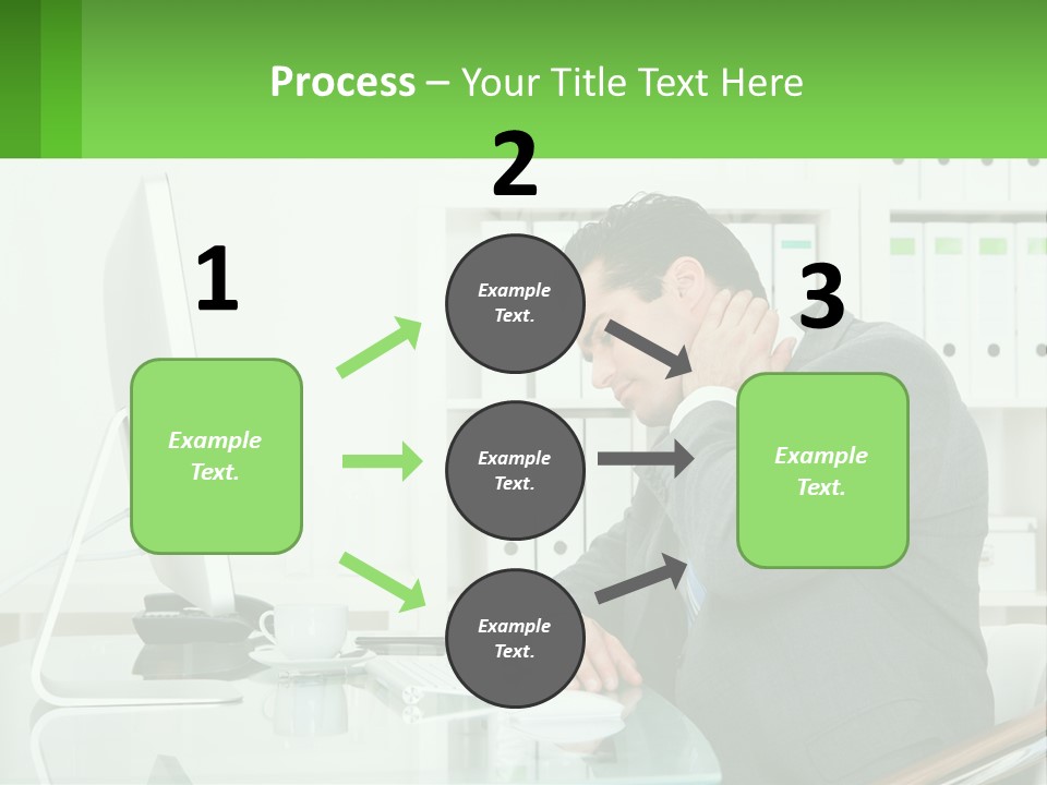 A Man Sitting At A Desk In Front Of A Computer PowerPoint Template