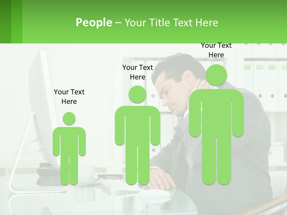 A Man Sitting At A Desk In Front Of A Computer PowerPoint Template