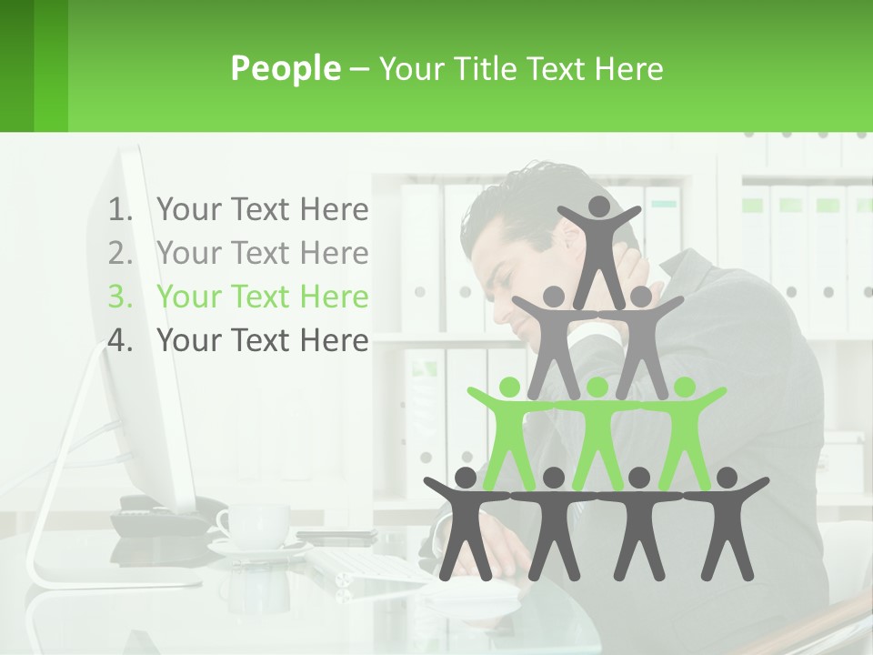 A Man Sitting At A Desk In Front Of A Computer PowerPoint Template