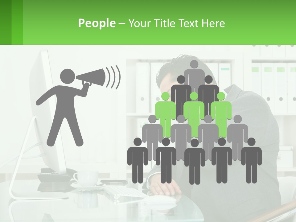 A Man Sitting At A Desk In Front Of A Computer PowerPoint Template