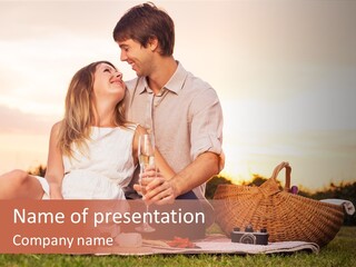 A Man And A Woman Sitting On A Blanket With A Bottle Of Champagne PowerPoint Template
