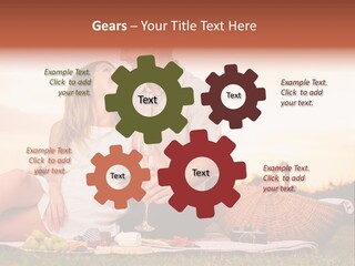 A Man And A Woman Sitting On A Blanket With A Bottle Of Champagne PowerPoint Template