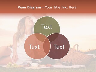 A Man And A Woman Sitting On A Blanket With A Bottle Of Champagne PowerPoint Template