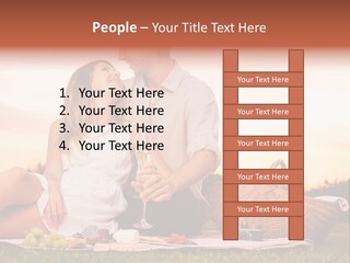 A Man And A Woman Sitting On A Blanket With A Bottle Of Champagne PowerPoint Template