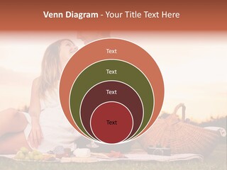 A Man And A Woman Sitting On A Blanket With A Bottle Of Champagne PowerPoint Template