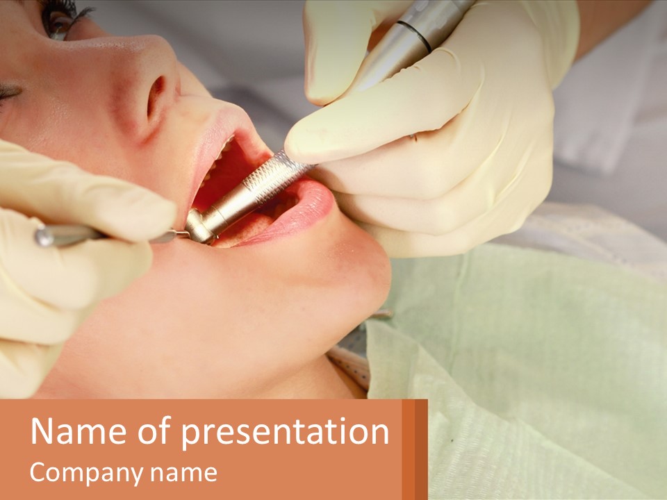 A Woman Getting Her Teeth Checked By A Dentist PowerPoint Template