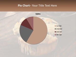 A Blueberry Muffin Sitting On Top Of A Wooden Table PowerPoint Template