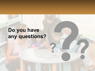 A Group Of Children Sitting Around A Table PowerPoint Template