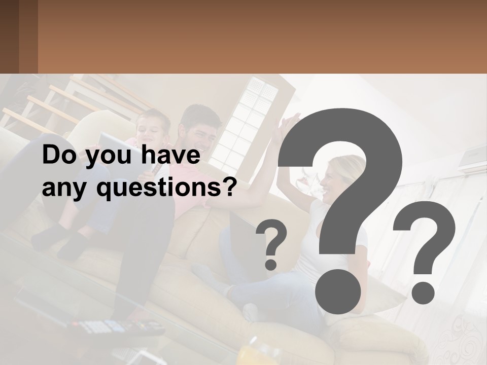 A Man And Woman Sitting On A Couch With A Child PowerPoint Template