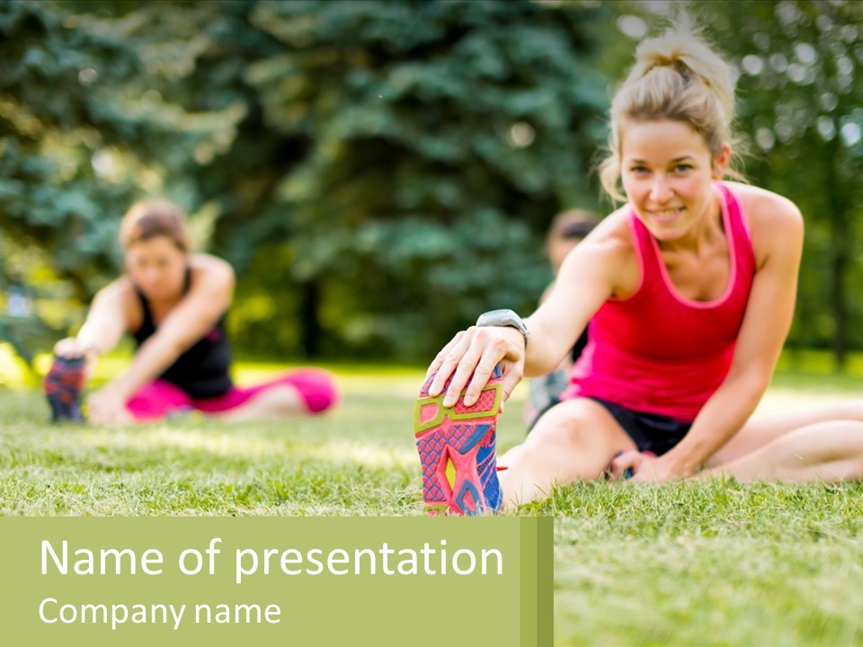 A Group Of Women Doing Stretching Exercises In A Park PowerPoint Template