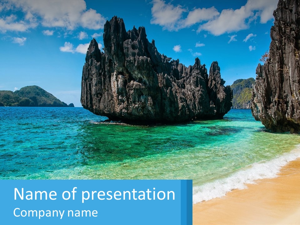 A Beach With A Rock Formation In The Middle Of It PowerPoint Template