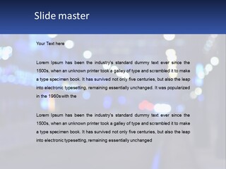 A Blurry Photo Of A City Street At Night PowerPoint Template
