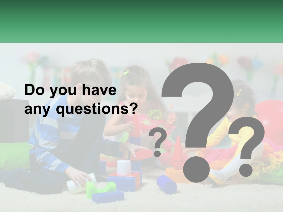 A Group Of Children Playing With Toys On The Floor PowerPoint Template