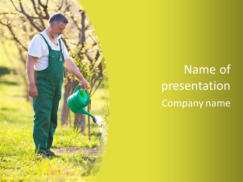 A Man Watering The Grass With A Green Watering Can PowerPoint Template