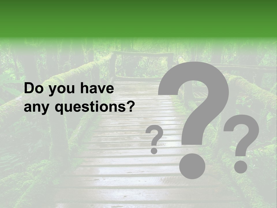 A Wooden Bridge In The Middle Of A Forest With Moss Growing On It PowerPoint Template