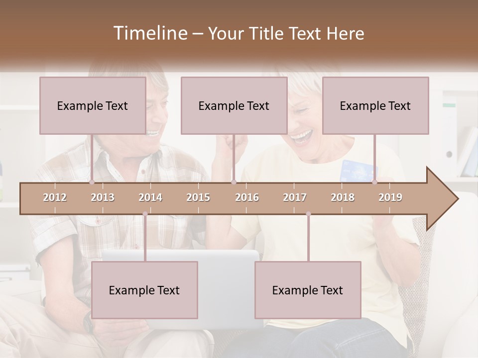 A Man And Woman Sitting On A Couch Holding A Credit Card PowerPoint Template