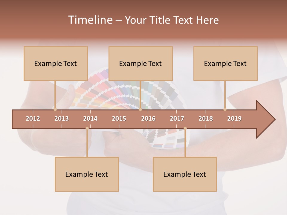 A Man Holding A Fan Of Color Samples In His Hands PowerPoint Template