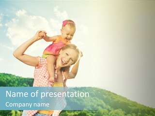 A Woman Holding A Child In Her Arms PowerPoint Template