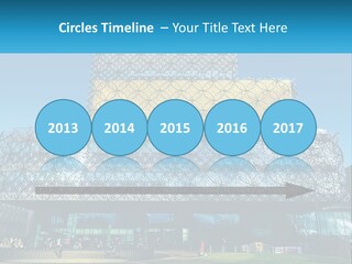 A Building That Has A Lot Of Windows On It PowerPoint Template