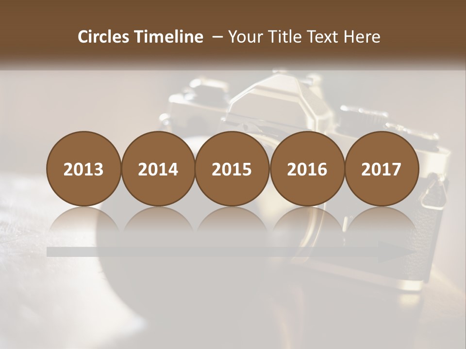 A Camera Sitting On Top Of A Wooden Table PowerPoint Template