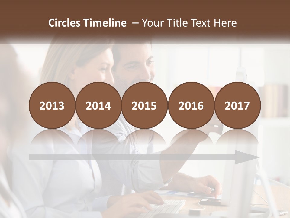 A Man And Woman Looking At A Computer Screen PowerPoint Template