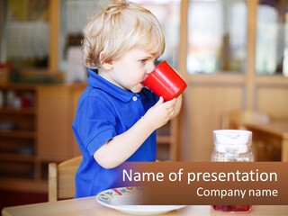 A Little Boy Drinking From A Red Cup PowerPoint Template