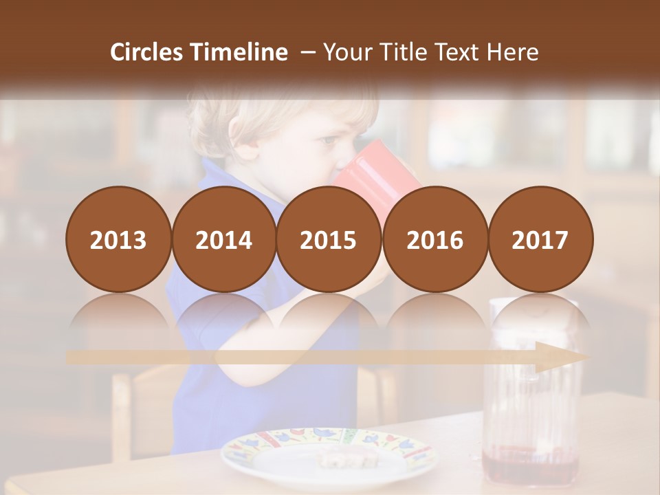 A Little Boy Drinking From A Red Cup PowerPoint Template