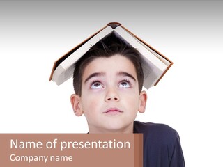 A Boy With A Book On Top Of His Head PowerPoint Template