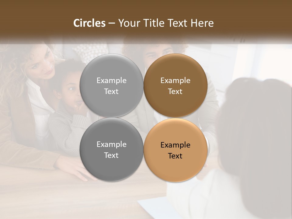 A Group Of People Sitting Around A Wooden Table PowerPoint Template