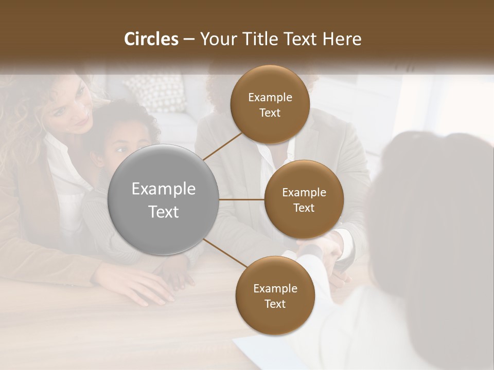 A Group Of People Sitting Around A Wooden Table PowerPoint Template