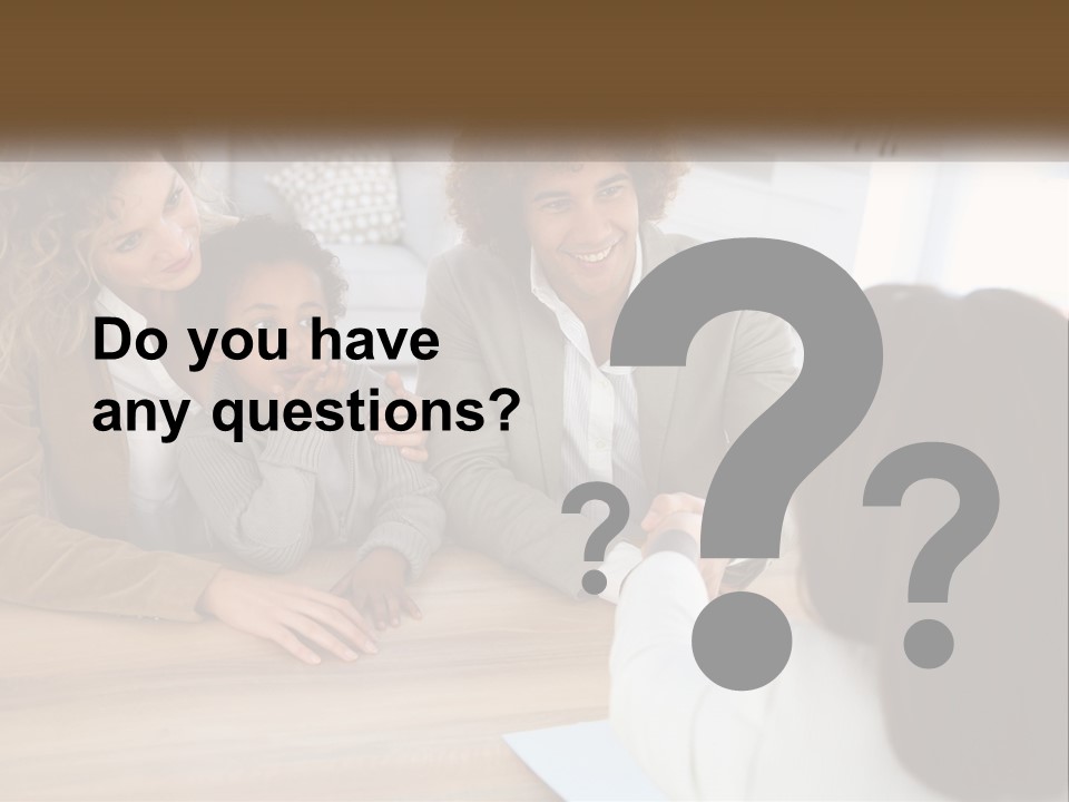 A Group Of People Sitting Around A Wooden Table PowerPoint Template