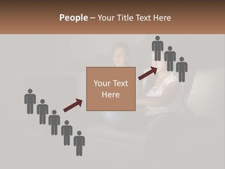 Two Girls Sitting On A Couch Watching A Movie PowerPoint Template