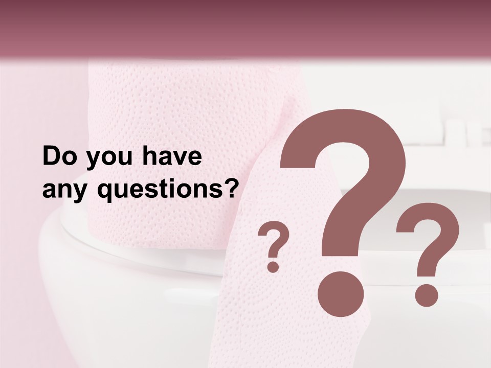 A White Toilet With A Pink Towel On Top Of It PowerPoint Template