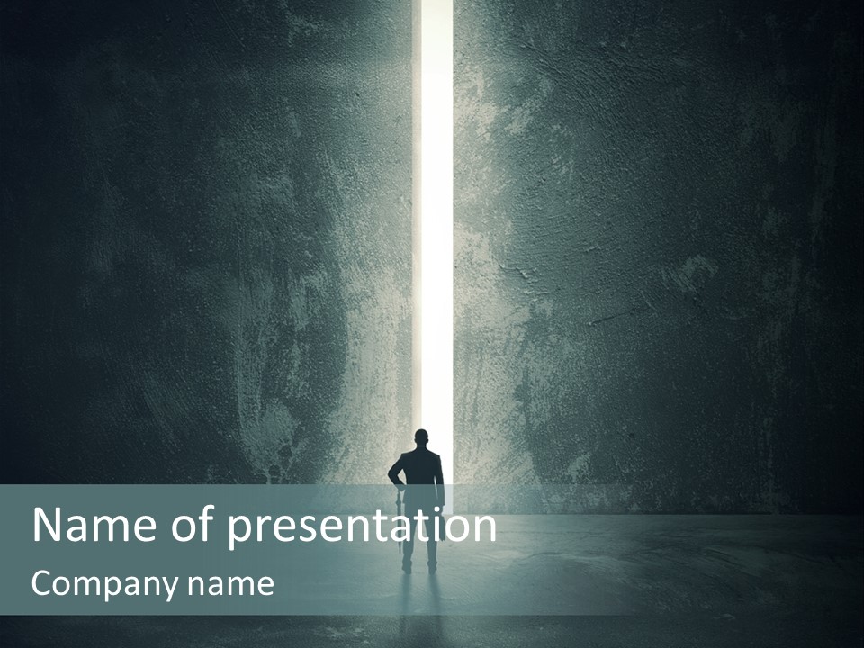 A Man Standing In Front Of A Light At The End Of A Tunnel PowerPoint Template