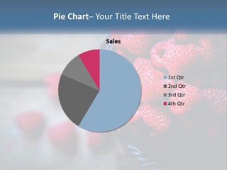 A Basket Filled With Raspberries On Top Of A Wooden Table PowerPoint Template