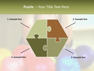 A Young Boy Is Holding His Head Above A Pile Of Balls PowerPoint Template