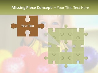 A Young Boy Is Holding His Head Above A Pile Of Balls PowerPoint Template