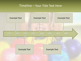 A Young Boy Is Holding His Head Above A Pile Of Balls PowerPoint Template