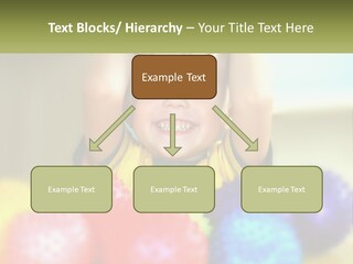 A Young Boy Is Holding His Head Above A Pile Of Balls PowerPoint Template