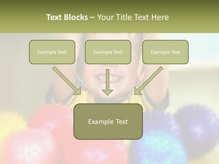 A Young Boy Is Holding His Head Above A Pile Of Balls PowerPoint Template